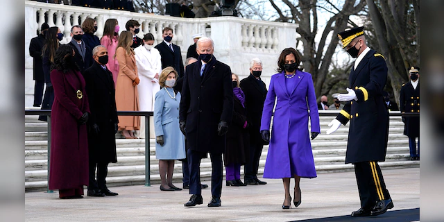President Joe Biden and Vice President Kamala Harris arrive at the Tomb of the Unknown Soldier at Arlington National Cemetery during Inauguration Day ceremonies in Arlington, Va.  (AP Photo/Evan Vucci)