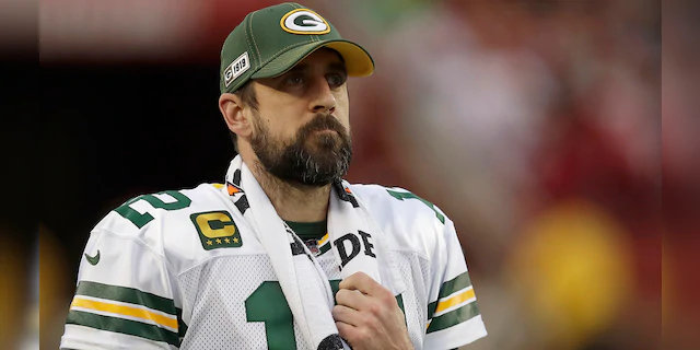 FILE - In this Jan. 19, 2020, file photo, Green Bay Packers quarterback Aaron Rodgers (12) watches from the sideline during the first half of the NFL NFC Championship football game against the San Francisco 49ers in Santa Clara, Calif. (AP Photo/Ben Margot, File)