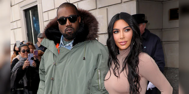 Kim Kardashian has yet to officially file divorce papers because she wants to "make the right decision" for their four children, a source claims.