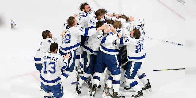 Tampa Bay Lightning players celebrate after defeating the Dallas Stars to win the Stanley Cup in Edmonton, Alberta, on Monday, Sept. 28, 2020. (AP)