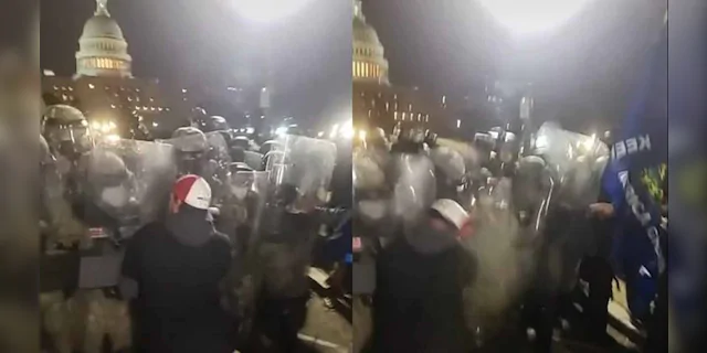 Capsel is allegedly seen clashing with National Guard troops holding the line with riot shields outside the U.S. Capitol. (Justice Department)