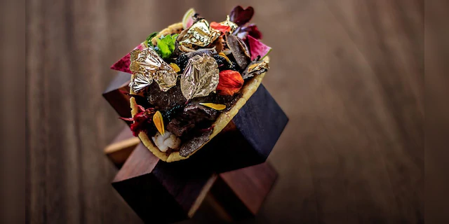 The guests will dine on foods like the "world’s most expensive taco," a dish that normally costs $25,000 and is made with Kobe beef, Almas Beluga caviar and langoustine. (Velas Resorts)