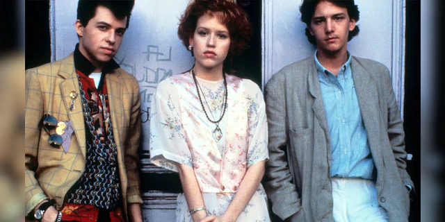Jon Cryer (left), Molly Ringwald and Andrew McCarthy on the set of the film 'Pretty In Pink', 1986.