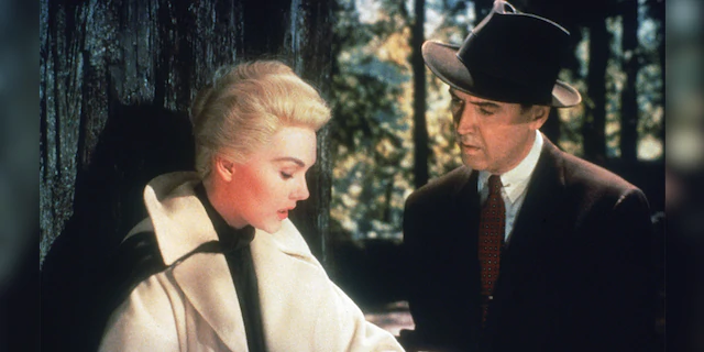James Stewart (1908 - 1997) and Kim Novak in a scene from Alfred Hitchcock's 'Vertigo.'