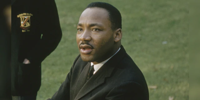 On the campus of Atlanta University (later renamed Clark Atlanta University) to discuss 'sit-in' protests, American religious and Civil Rights leader Martin Luther King Jr sits with his hands on his knee, mid-May, 1960. (Photo by Howard Sochurek/The LIFE Picture Collection via Getty Images)