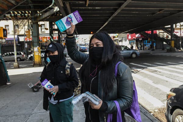 Handing out literature about domestic violence in the Bronx in April.