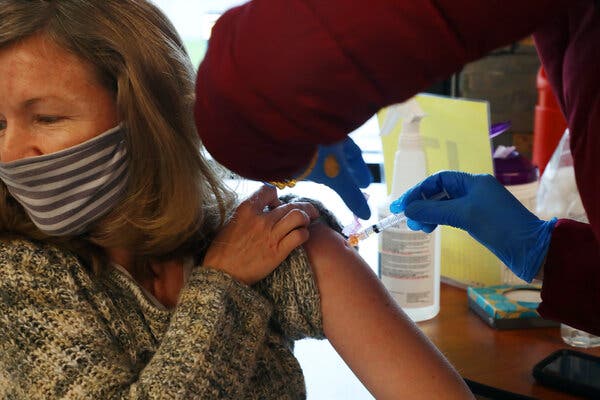 Mary Freeman, a preschool teacher, receiving an injection of the Moderna vaccine in Mountain View, Calif., last month.