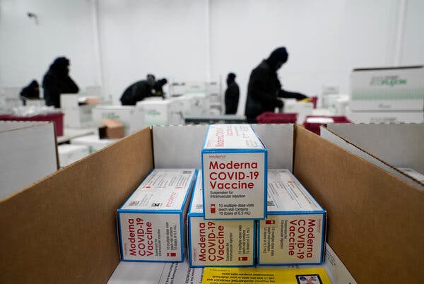 Boxes of Moderna’s vaccine under preparation for shipping at the McKesson distribution center in Olive Branch, Miss., in December.