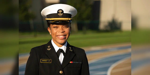 Barber became the Naval Academy's first African American female brigade commander, leading 4,500 midshipmen until she graduates. (Petty Officer 2nd Class Nathan Burke/U.S. Navy via AP)