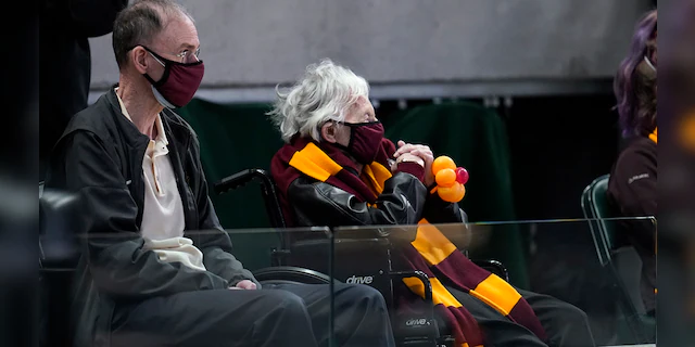 Sister Jean Dolores Schmidt watches Loyola Chicago play Illinois at Bankers Life Fieldhouse in Indianapolis, Sunday, March 21, 2021. (AP Photo/Paul Sancya)