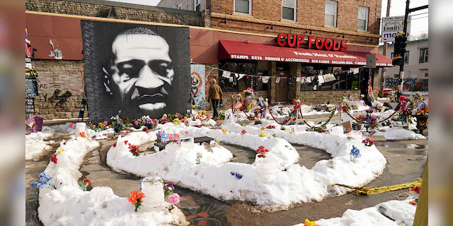 George Floyd Square is shown on Feb. 8, 2021, in Minneapolis. Ten months after police officers brushed off George Floyd's moans for help on the street outside a south Minneapolis grocery, the square remains a makeshift memorial for Floyd. (AP Photo/Jim Mone)