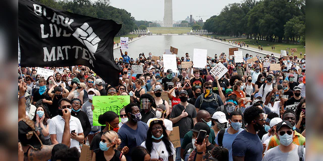 FILE - In this June 6, 2020, file photo, demonstrators protest at the Lincoln Memorial in Washington, over the death of George Floyd, a black man who was in police custody in Minneapolis. (AP Photo/Alex Brandon, File)