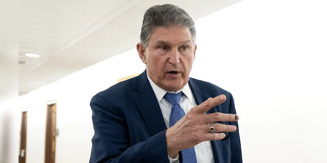 Senator Joe Manchin, a Democrat from West Virginia, speaks to members of the media while departing a bipartisan Senate luncheon in Dirksen Senate Office Building in Washington, D.C., U.S., on Wednesday, March 3, 2021. (Photographer: Stefani Reynolds/Bloomberg via Getty Images)
