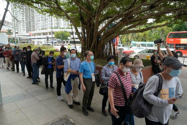 People lined up to receive vaccinations in late February in Hong Kong, where strict quarantine rules have kept the coronavirus largely in check.