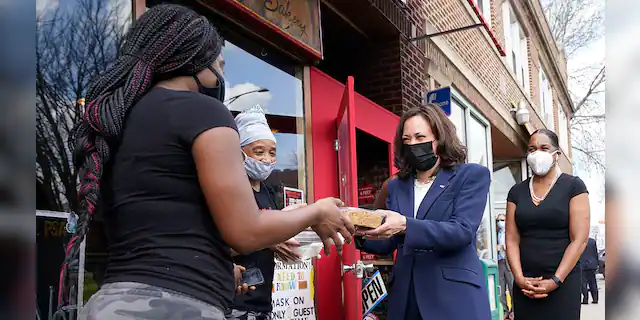 Vice President Kamala Harris visits Brown Sugar Bakery Tuesday, April 6, 2021 in Chicago. At right is Illinois Lt. Gov. Juliana Stratton. (AP Photo/Jacquelyn Martin)