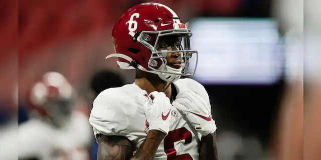 Alabama wide receiver DeVonta Smith (6) warms up before the first half of the Southeastern Conference championship NCAA college football game against Florida, Saturday, Dec. 19, 2020, in Atlanta. (AP Photo/Brynn Anderson)