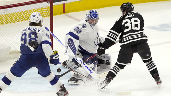 Lightning clinch playoff spot with 7-4 victory over Chicago
