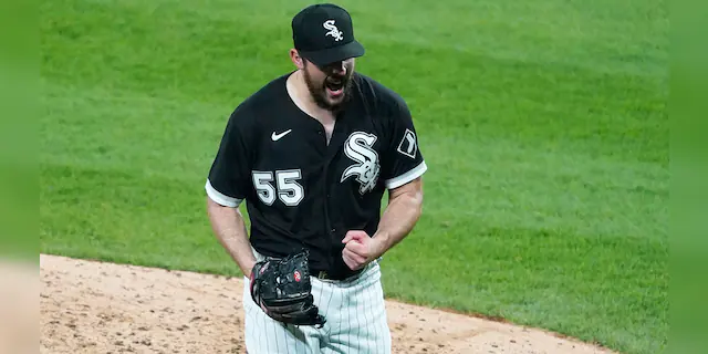 Chicago White Sox starting pitcher Carlos Rodon (55) pumps his fist after striking out Cleveland Indians' Yu Chang (2) to end the sixth inning of a baseball game, Wednesday, April, 14, 2021, in Chicago. (AP Photo/David Banks)