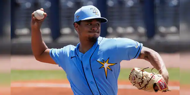 Tampa Bay Rays starting pitcher Chris Archer (22) delivers in the second a spring training baseball game against the Minnesota Twins on Wednesday, March 24, 2021, in Port Charlotte, Fla. (AP Photo/John Bazemore)