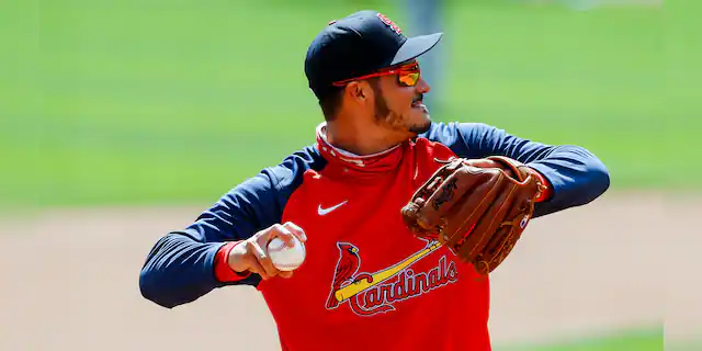 St. Louis Cardinals' Nolan Arenado throws during a baseball team workout in Cincinnati, Wednesday, March 31, 2021. The Cardinals play in an opening day game at the Cincinnati Reds on Thursday. (AP Photo/Aaron Doster)