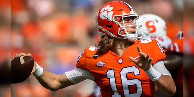 Clemson quarterback Trevor Lawrence (16) makes a pass during an NCAA college football game against Syracuse in Clemson, S.C., on Saturday, Oct. 24, 2020. (Ken Ruinard/Pool Photo via AP)