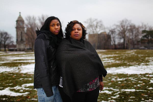 Samaria Rice, with her daughter Tajai, at the site where her 12-year-old son, Tamir, was killed by the police in 2014. 