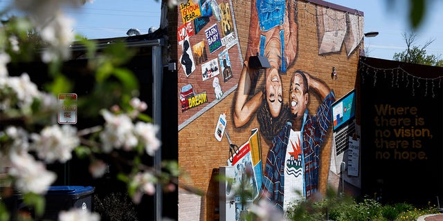 This photo shows a mural painted on the outside wall of Gibbs-Morrison Cultural Center in the 5th Ward of Evanston, Ill., Thursday, April 29, 2021. 