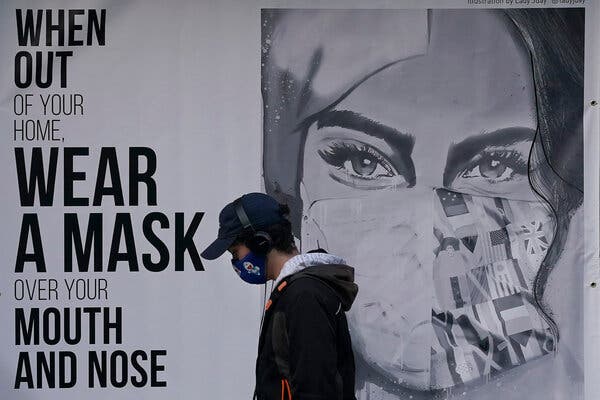 Signage in San Francisco last year urges mask wearing.