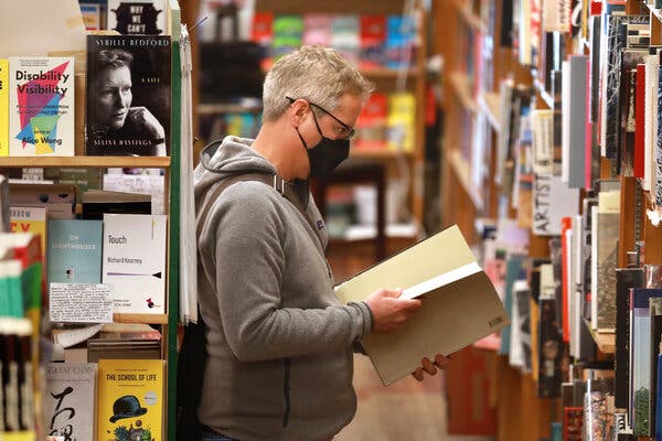 At a bookstore in San Francisco in March. Until the pandemic, there had seldom been a cultural push for mask wearing in the United States.