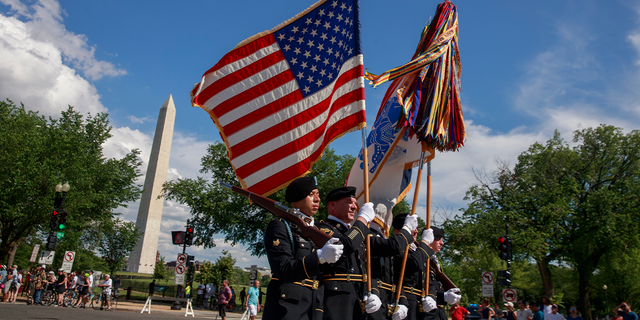 2019/05/27: United States Army Soldiers last marched in the National Memorial Day Parade in Washington D.C. on May 27, 2019. The parade was canceled in 2020 due to COVID-19. (Jeremy Hogan/SOPA Images/LightRocket via Getty Images)