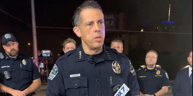 This photo provided by Austin Police Department shows Chief Chacon providing an update on overnight shootings in Austin, Texas, early Saturday, June 12, 2021.  Chacon says gunfire erupted in a busy entertainment district downtown early Saturday injuring several.   (Austin Police Department via AP)