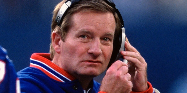 Head Coach Jim Fassel of the New York Giants looks on from the sidelines against the Minnesota Vikings during the NFC Championship Game on January 14, 2001, at Giants Stadium in East Rutherford, New Jersey. The Giants won the game 41-0.  (Photo by Focus on Sport/Getty Images)