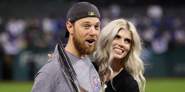 Ben Zobrist, left, and his wife Julianna, after the Cubs won the World Series in 2016.  (Photo by Ezra Shaw/Getty Images)