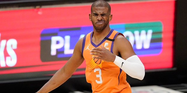 Phoenix Suns guard Chris Paul reacts after being hit in the eye during the first half in Game 6 of the NBA basketball Western Conference Finals against the Los Angeles Clippers Wednesday, June 30, 2021, in Los Angeles. (AP Photo/Mark J. Terrill)