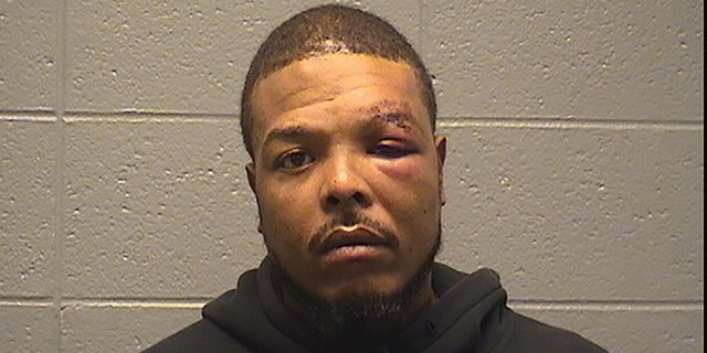 Clark, pictured above in a booking photo, was booked into the Cook County Jail and held on $100,000 bond.
