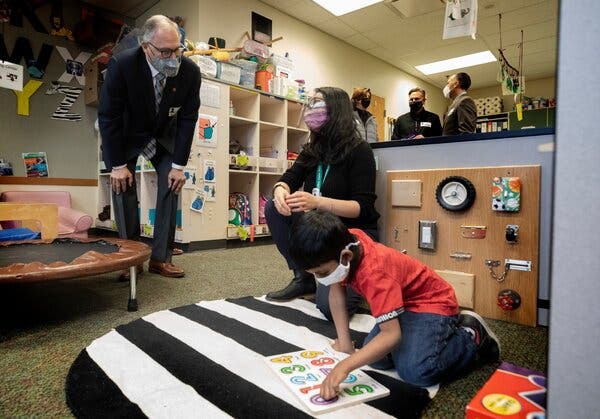 Gov. Jay Inslee of Washington visiting Phantom Lake Elementary School in Bellevue, Wash., in March. “We are well past the point where testing is enough to keep people safe,” Mr. Inslee said on Wednesday.