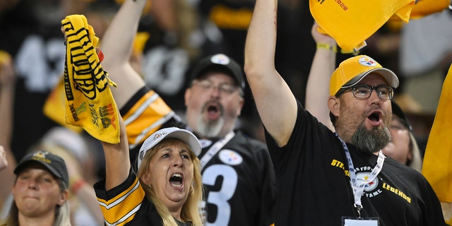 Pittsburgh Steelers fans cheer during the second half of the Pro Football Hall of Fame NFL preseason game against the Dallas Cowboys, Thursday, Aug. 5, 2021, in Canton, Ohio. (Associated Press)