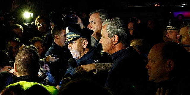 Then-Boston Police Commissioner Edward Davis speaks during a media briefing in the parking lot of the Watertown Mall on April 19, 2013 in Watertown, Massachusetts. (Jared Wickerham/Getty Images)