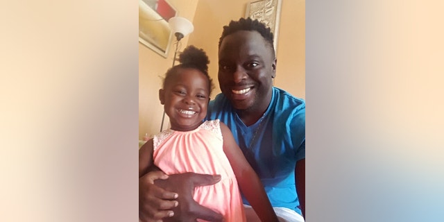 Travell Miller of Chicago and his daughter (Facebook)