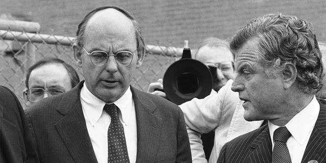 FILE - In this Oct. 14, 1982, file photo, Illinois Democratic gubernatorial candidate Adlai Stevenson III, left, talks with Sen. Edward Kennedy, right, talk as they finish a series of appearances in Chicago. Stevenson III, of Illinois, has died at his home on Chicago’s North Side. He was 90. On Tuesday, Sept. 7, 2021, his son Adlai Stevenson IV confirmed the Democrat’s death and said his father had dementia. (AP Photo/File)