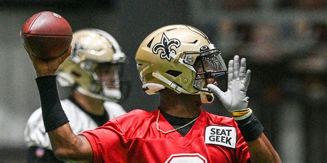 New Orleans Saints quarterback Jameis Winston (2) throws a pass during the team's NFL football training camp practice in Metairie, La., Tuesday, Aug. 24, 2021. (Max Becherer/The Times-Picayune/The New Orleans Advocate via AP)