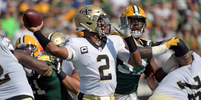 New Orleans Saints quarterback Jameis Winston (2) throws a pass during the first half of an NFL football game against the Green Bay Packers, Sunday, Sept. 12, 2021, in Jacksonville, Fla. (AP Photo/Phelan M. Ebenhack)