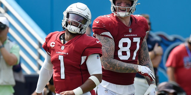 Arizona Cardinals quarterback Kyler Murray (1) is congratulated by tight end Maxx Williams (87) after Murray ran for a touchdown against the Tennessee Titans in the first half of an NFL football game Sunday, Sept. 12, 2021, in Nashville, Tenn. (AP Photo/Mark Zaleski)