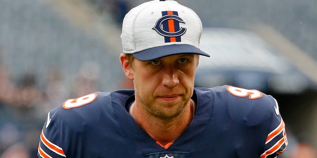 Chicago Bears quarterback Nick Foles walks off the field after their game against the Buffalo Bills Aug 21, 2021, at Soldier Field in Chicago. 