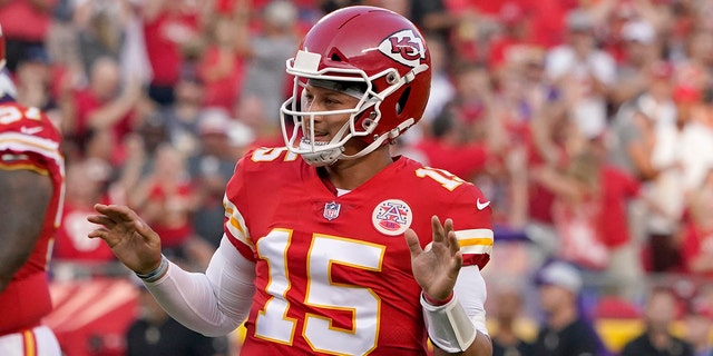 Kansas City Chiefs quarterback Patrick Mahomes celebrates after throwing a touchdown pass during the first half of an NFL football game against the Minnesota Vikings Friday, Aug. 27, 2021, in Kansas City, Mo. (AP Photo/Ed Zurga)