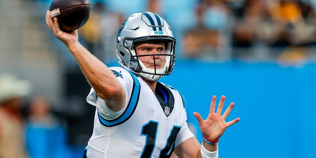 Carolina Panthers quarterback Sam Darnold warm ups before a preseason NFL football game against the Pittsburgh Steelers Aug. 27, 2021, in Charlotte, N.C. Darnold gears up to face his former team, the New York Jets, in the season opener on Sunday. (AP Photo/Nell Redmond, File)