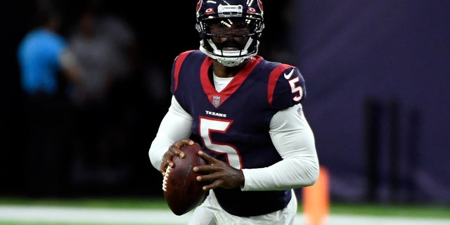 Houston Texans quarterback Tyrod Taylor (5) looks to throw a pass against the Tampa Bay Buccaneers during the first half of an NFL preseason football game Saturday, Aug. 28, 2021, in Houston. (AP Photo/Justin Rex)