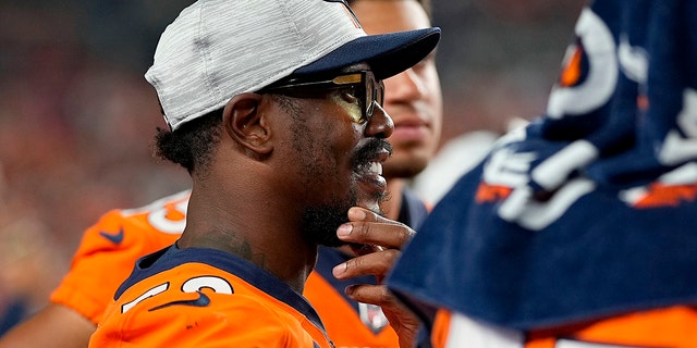 Denver Broncos outside linebacker Von Miller watches from the sidelines during the second half of an NFL preseason football game against the Los Angeles Rams, Saturday, Aug. 28, 2021, in Denver. (AP Photo/Jack Dempsey)