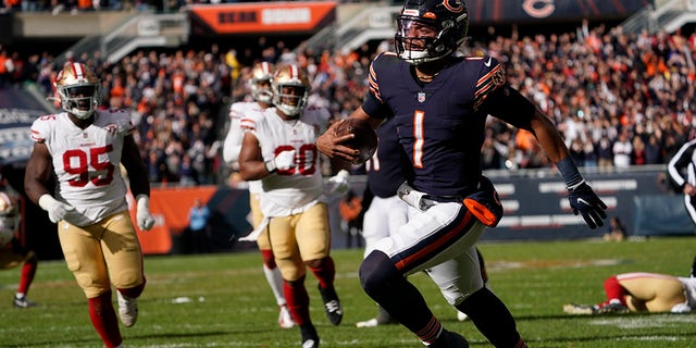 Chicago Bears quarterback Justin Fields runs for the end zone and a touchdown against the San Francisco 49ers during the second half Sunday, Oct. 31, 2021, in Chicago.