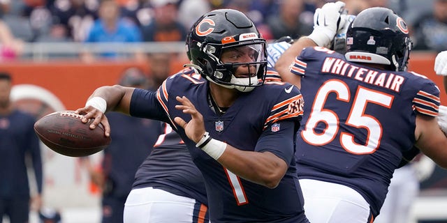 Chicago Bears quarterback Justin Fields passes during the first half of an NFL football game against the Detroit Lions Sunday, Oct. 3, 2021, in Chicago. 